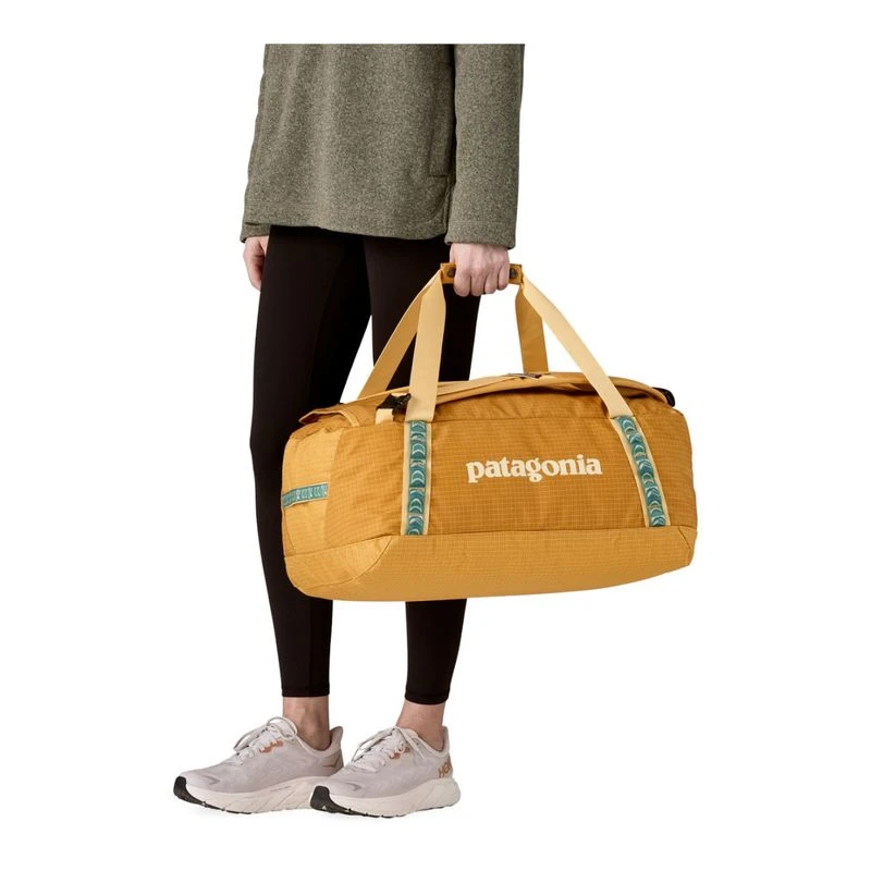 yellow patagonia bag Atom Sling 8L Cleverly designed to accommodates various loads Yellow Patagonia Travel Duffel Patagonia